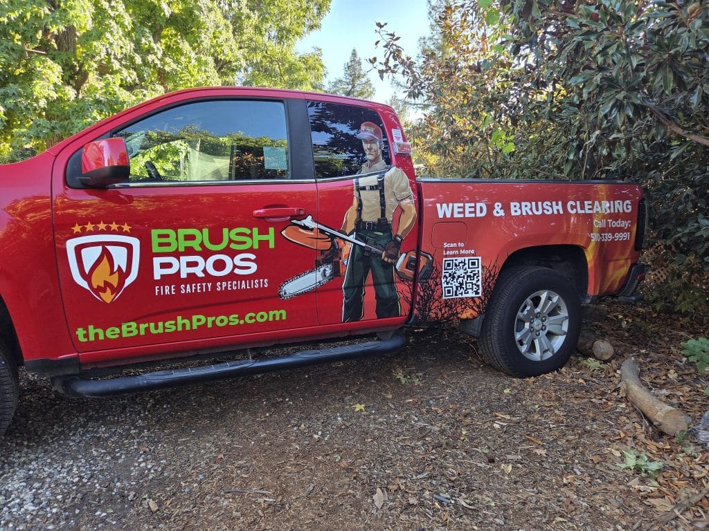 A brushpros truck at a job site.